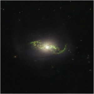 Green, glowing whorls of ionized oxygen around the galaxy NGC 5972. Credit: NASA, ESA, and W. Keel (University of Alabama, Tuscaloosa)